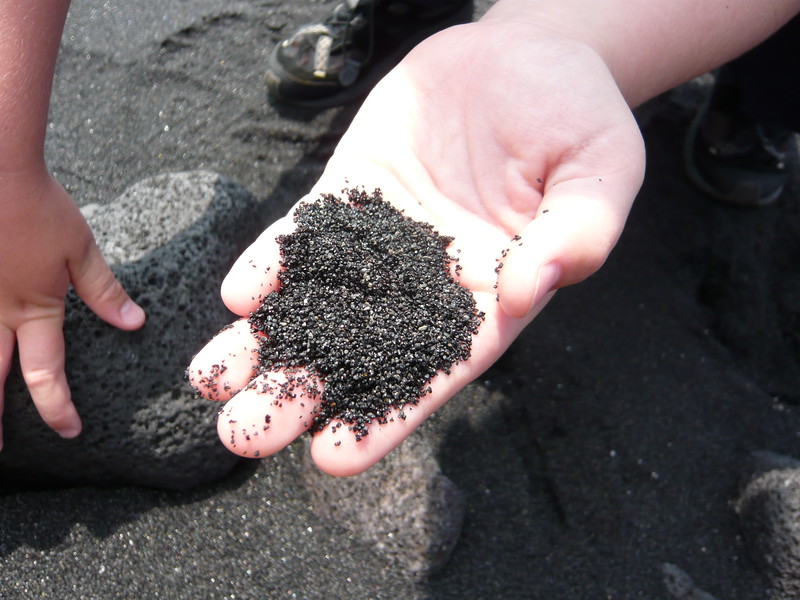 cheaper alaska or hawaii black sand beach