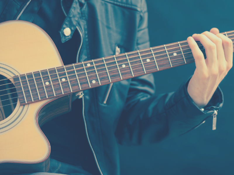 female acoustic guitarist